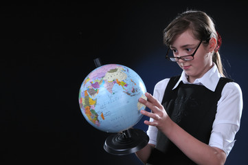 Schoolgirl and globe