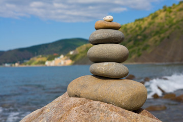 balanced stones on the sea