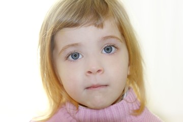 blond little girl blue eyes portrait