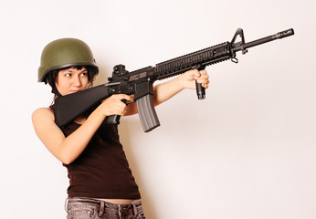 girl holding gun