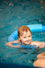 Fototapeta na wymiar little child in swimming pool