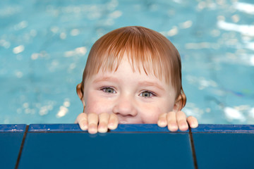 little child in swimming pool