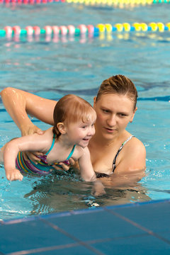 mother and daughter in the pool