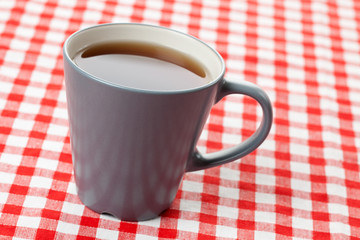 tea on checkered tablecloth