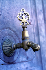 close up shot of an old faucet