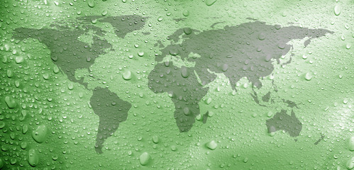 close up shot of water droplets with world map