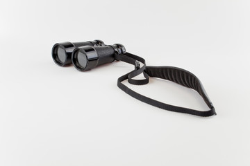 Old binoculars isolated on white