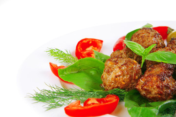meat balls on basil leaf