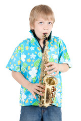 boy plays a saxophone