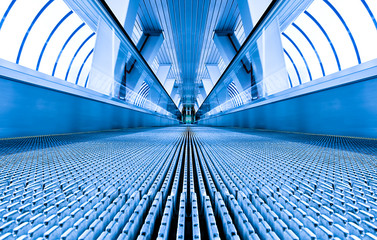 Fototapeta premium blue modern escalator in business center