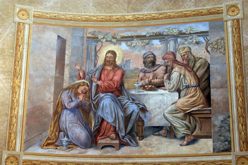 Saint Mary Magdalene wipes the feet of Jesus © zatletic