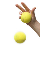 hand and tennis balls