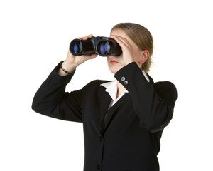 young business woman looking through binoculars