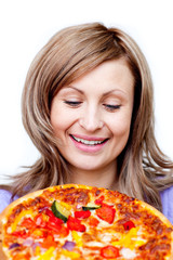 Bright woman holding a pizza