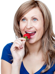 Bright woman eating strawberries