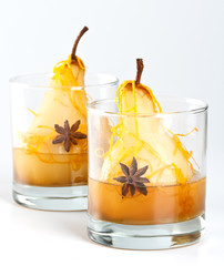 Dessert with pears in syrup on white background