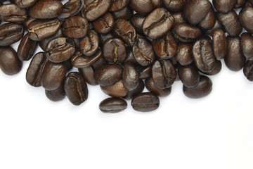 Coffeebeans over white