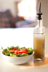 A bowl of salad with dressing