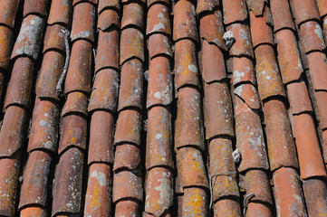 Old red tiled roof background
