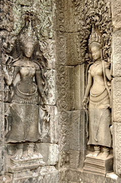 Girls on the all of Bayon temple, Angkor, Cambodia