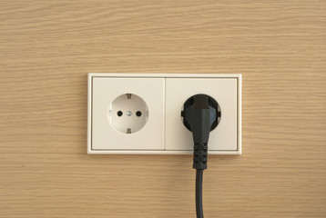 Wall outlet with power cord