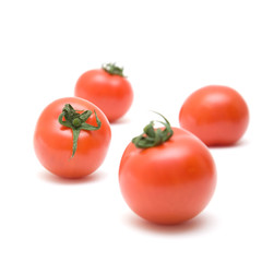 four ripe red tomatoes; isolated on white background; square com