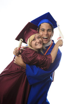 asian man and blond woman graduates in cap and gown