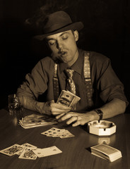old style gambler with money and cigar