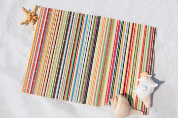 straw mat on beach