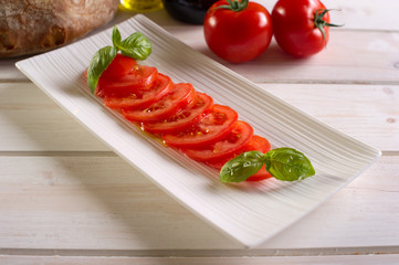 tomatoes salad on dish-insalata di pomodori
