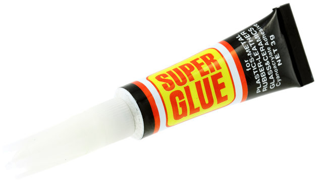 tube colle "super glu", fond blanc