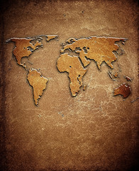 world map on leather background © Eky Chan