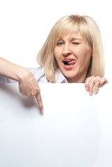 Attractive funny woman holding white empty paper