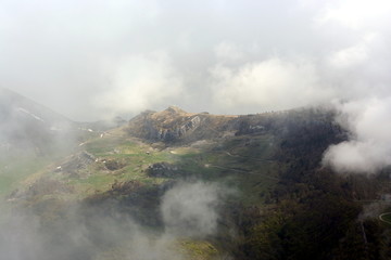 View on peaks and valleys under coulds