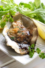oyster au gratin with balsamic vinegar-ostrica gratinata