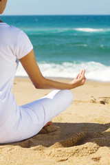 Fototapeta na wymiar meditation on beach