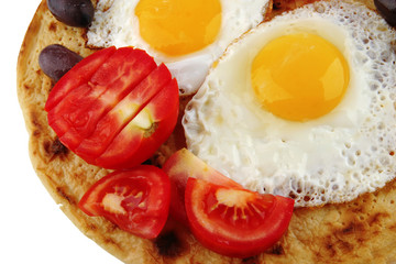 fried eggs with vegetables