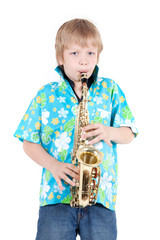 boy plays on saxophone