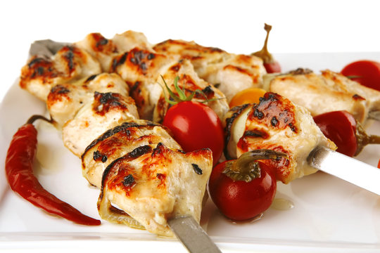 roasted chicken kebab on white