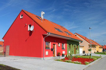 Colorful semi-detached houses - modern residential housing