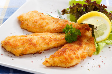 Fried fish fillet with vegetables