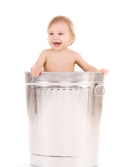 baby in trash can