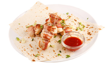 chicken on a grill spit