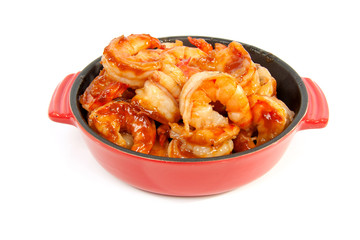little casserole with shrimp over white background