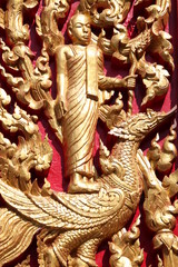carving on door of temple,  Na Kha, Wapipatum, Mahasarakam