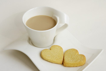 Cookies in the form of heart with a coffee cup
