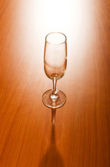 Wine glasses against wooden background
