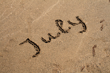 Text on the sand