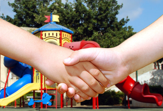 children shaking hands