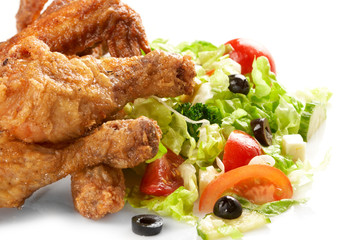 Chicken legs with fresh vegetables